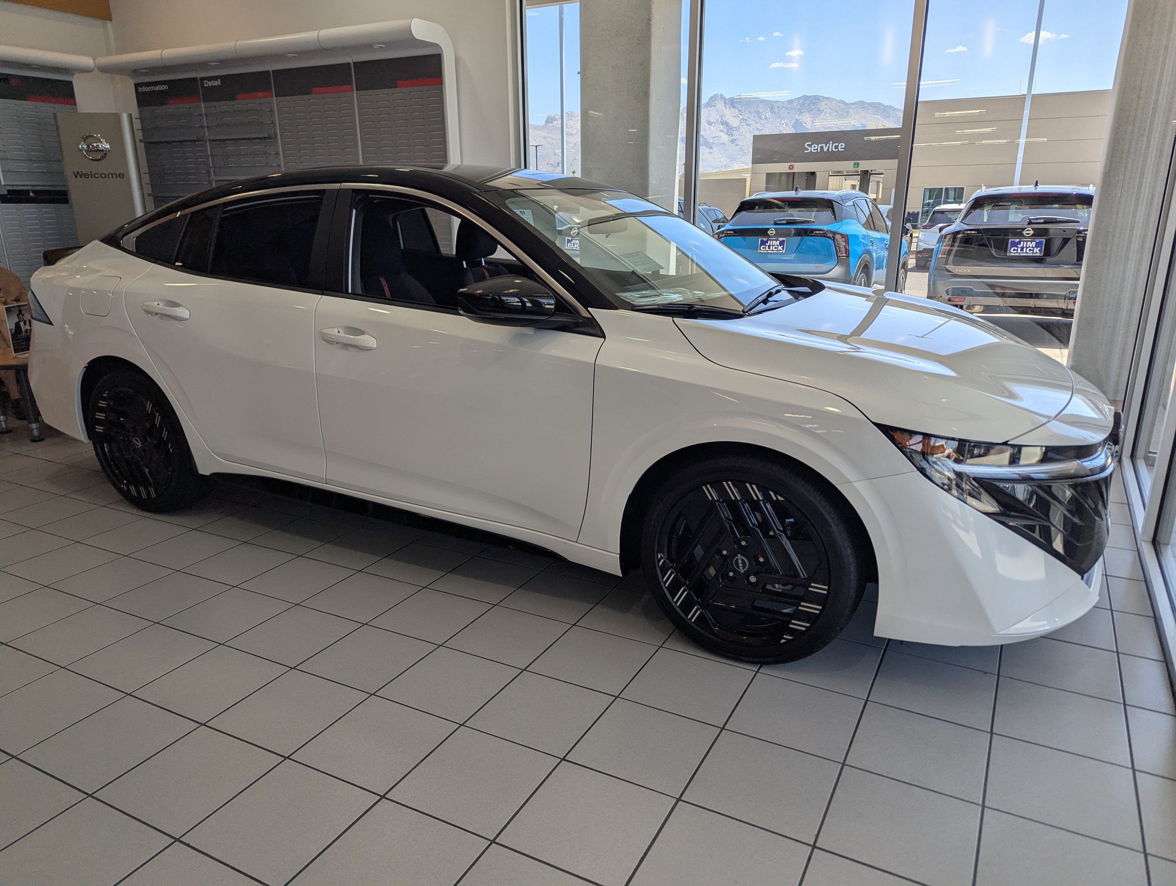 2026 Nissan Sentra SR in Aspen White Tricoat/Super Black — front three-quarter view