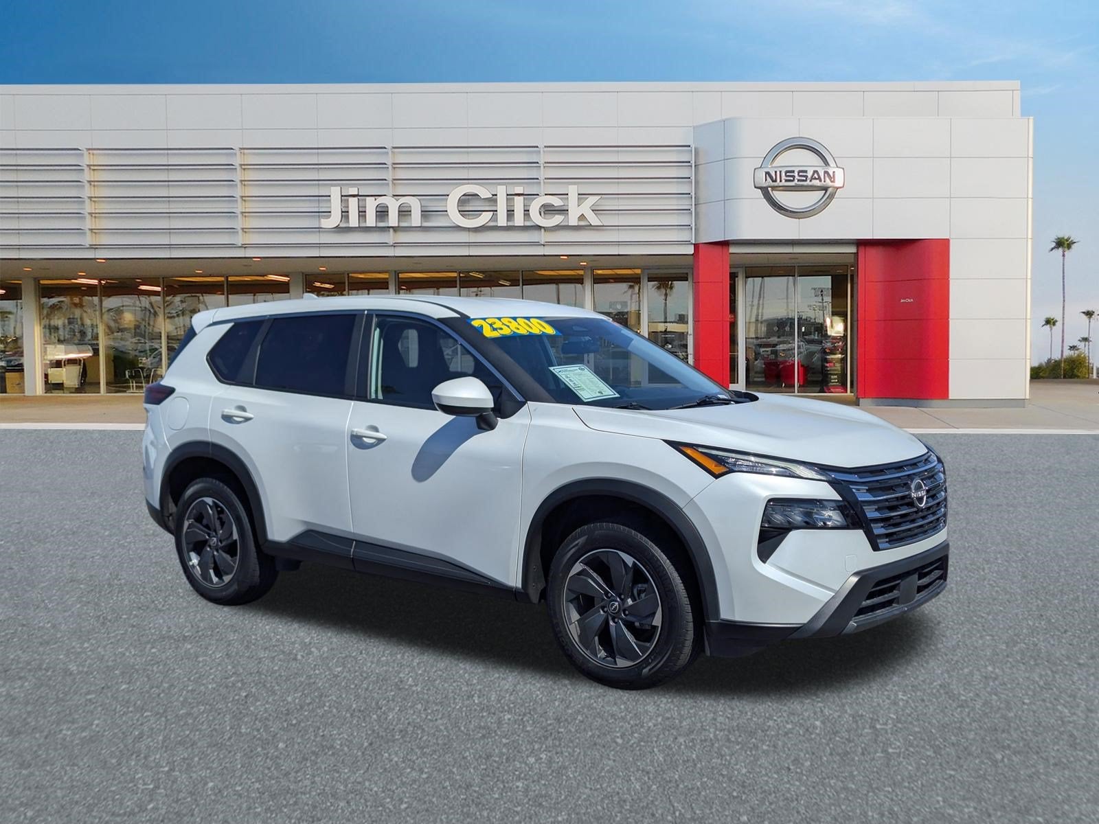 2025 Nissan Rogue SV in Everest White Pearl — front three-quarter view
