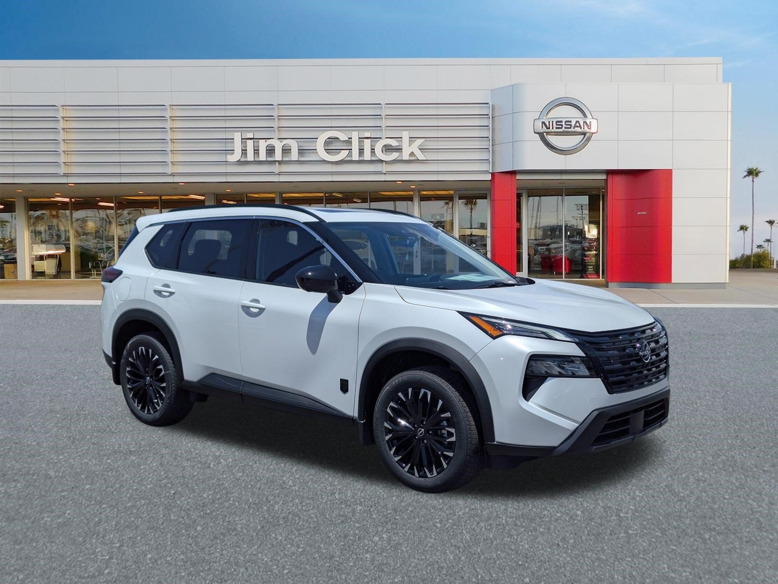 2026 Nissan Rogue Dark Armor in Everest White Pearl Tricoat — front three-quarter view